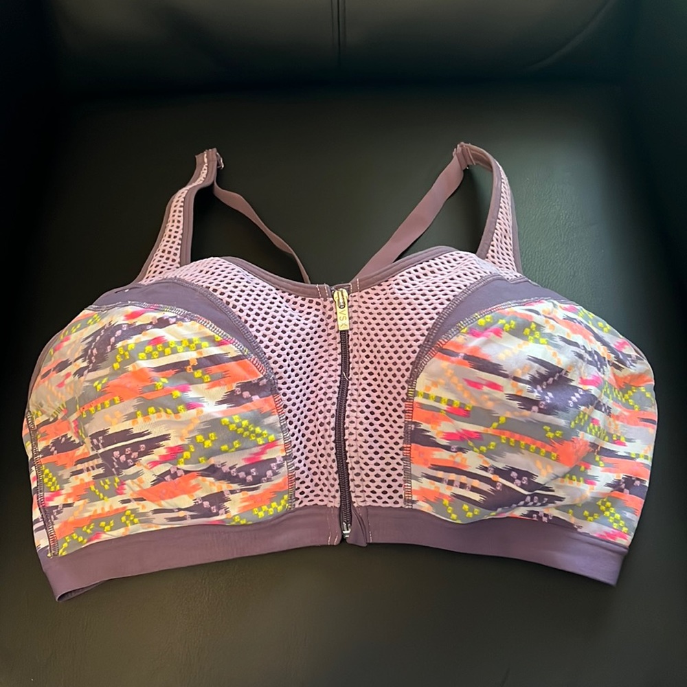 VSX 38DD sports bra clip on for the cups then it zips